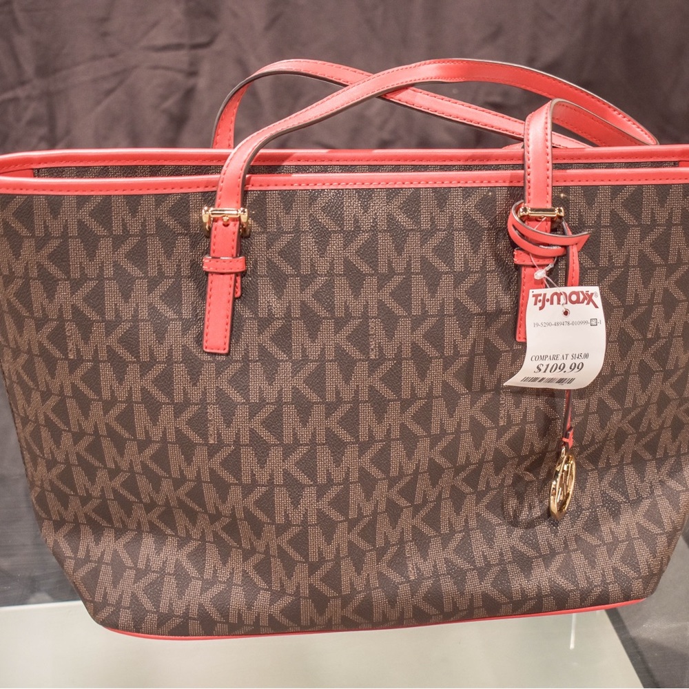 Brand new with tags red and brown Michael Kors purse!